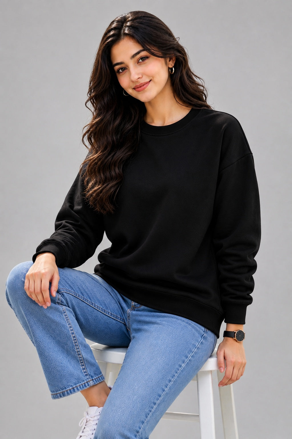 Women's black sweatshirt seated view